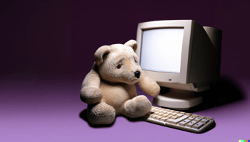 Sad bear at a computer